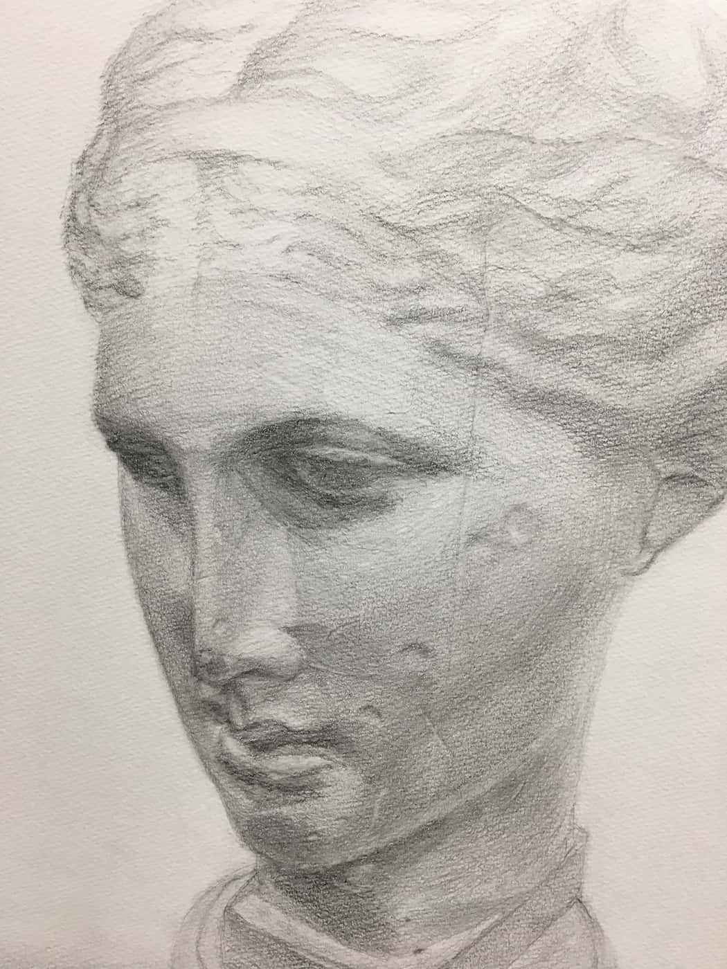 Pencil drawing of a woman's head.